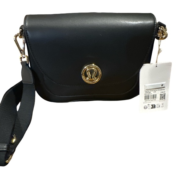 lululemon athletica Handbags - Lululemon Athletica Black Crossbody Bag with Gold Accents